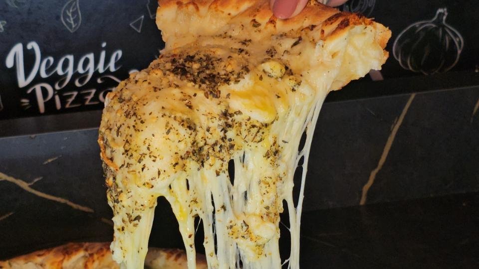 Quatro Queijos Santa Pizza Dourados